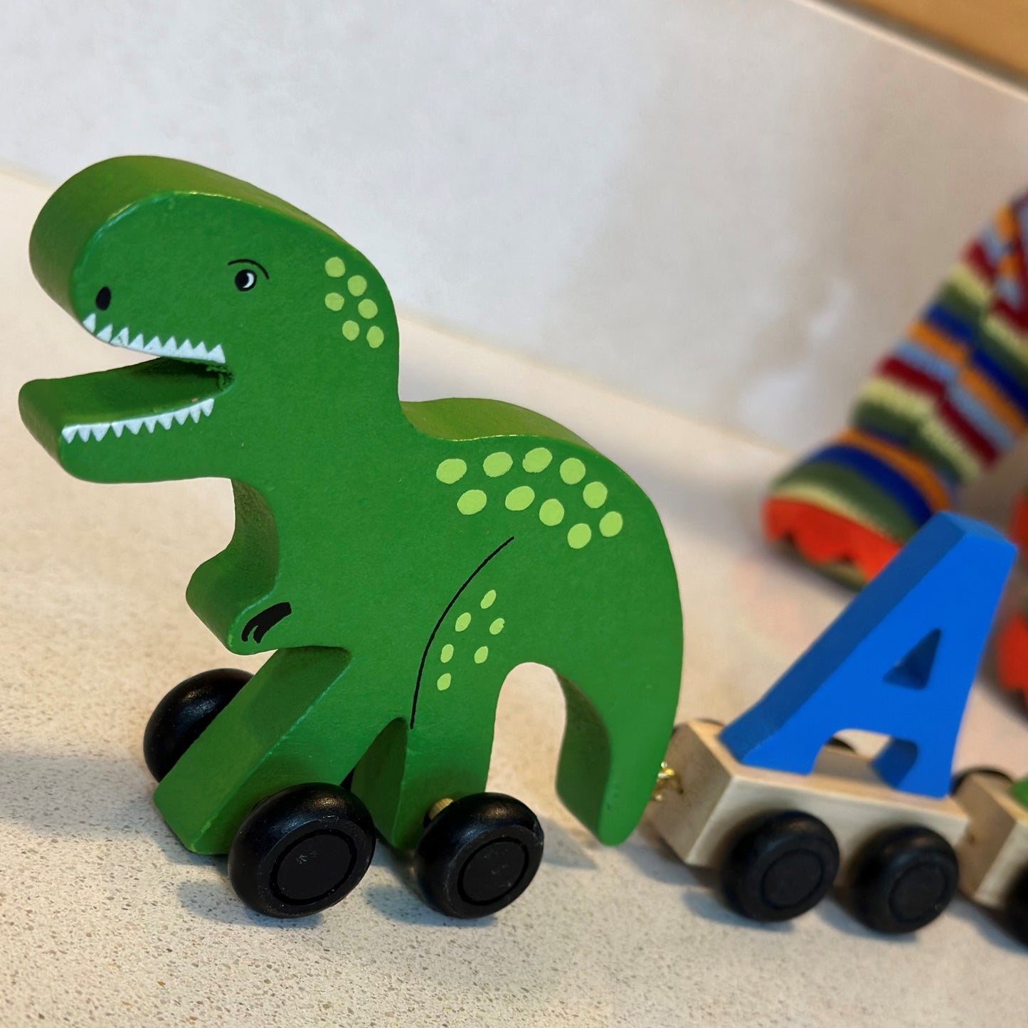Personalised Coloured Wooden Dinosaur Name Train